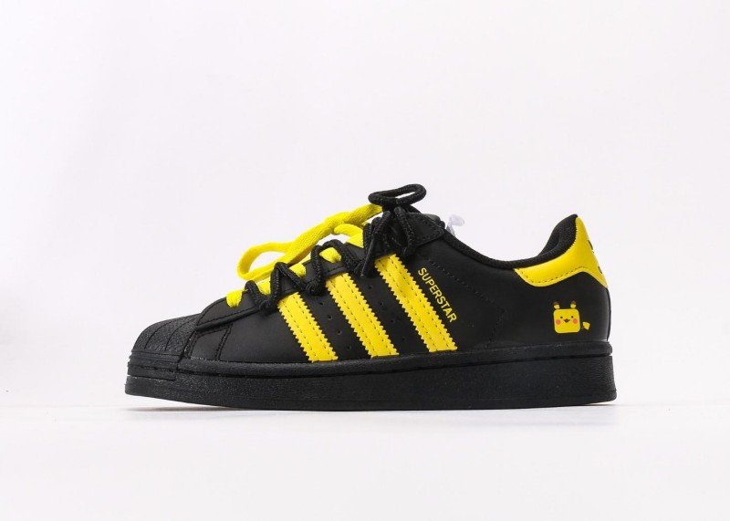 adidas-superstar-black-and-yellow-cartoon-sneakers
