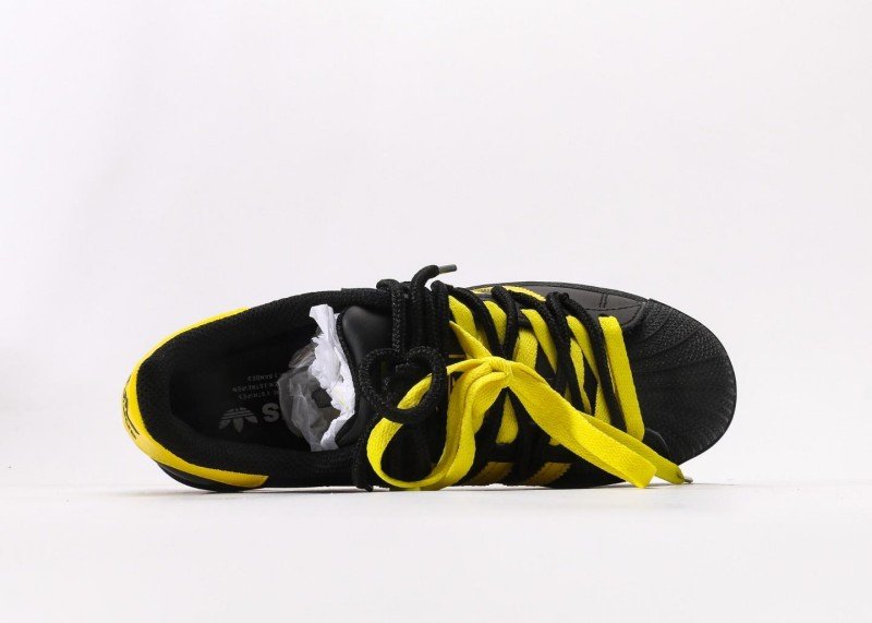 Adidas Superstar black and yellow cartoon sneakers - Image 3
