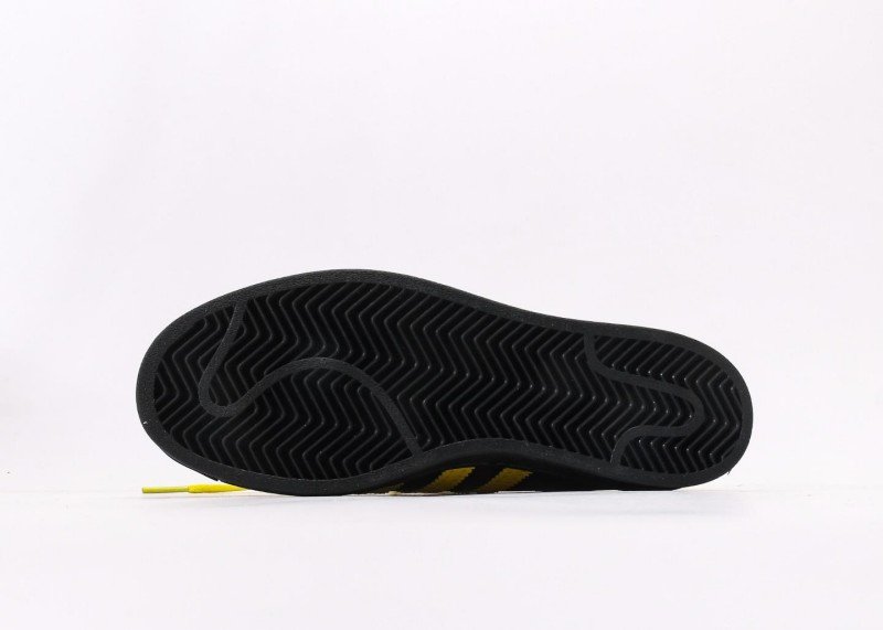 Adidas Superstar black and yellow cartoon sneakers - Image 4