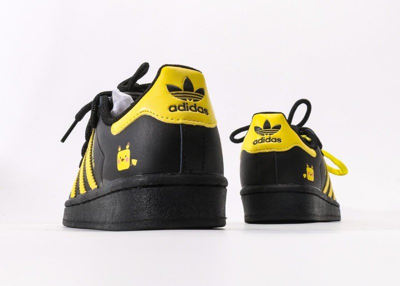 Adidas Superstar black and yellow cartoon sneakers - Image 6