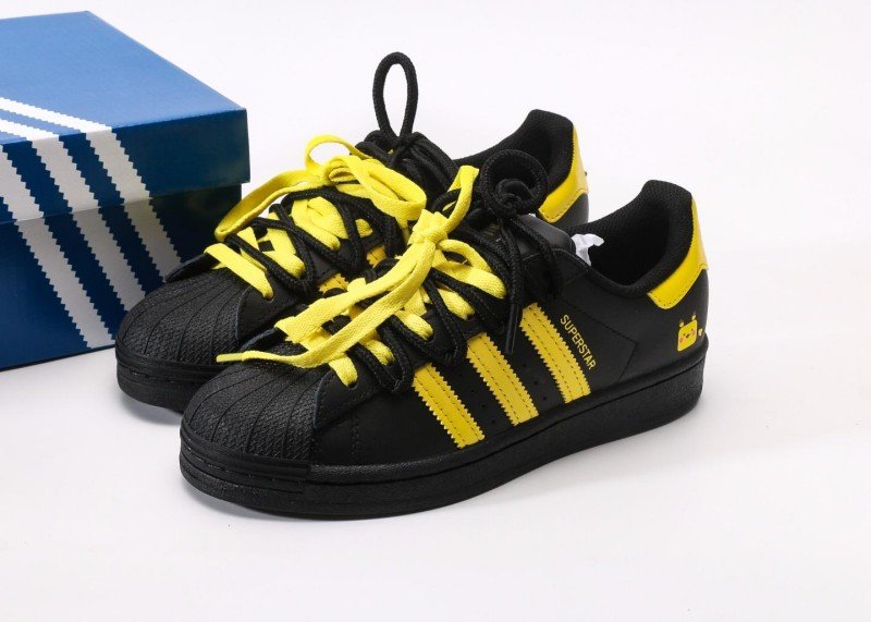 adidas-superstar-black-and-yellow-cartoon-sneakers