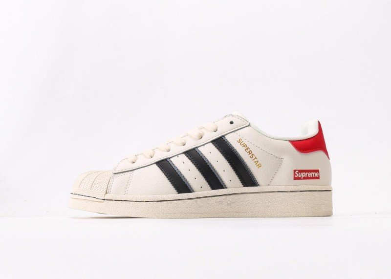 adidas-x-supreme-collaboration-off-white-striped-sneakers