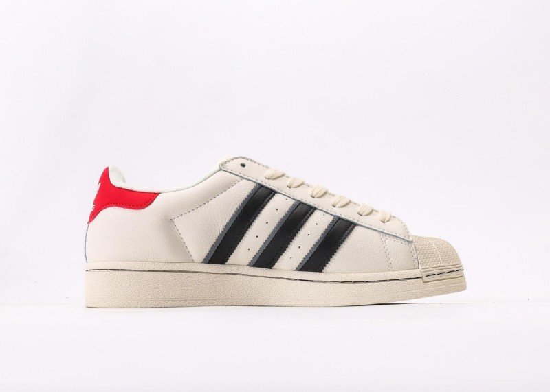 adidas x Supreme collaboration off-white striped sneakers - Image 2