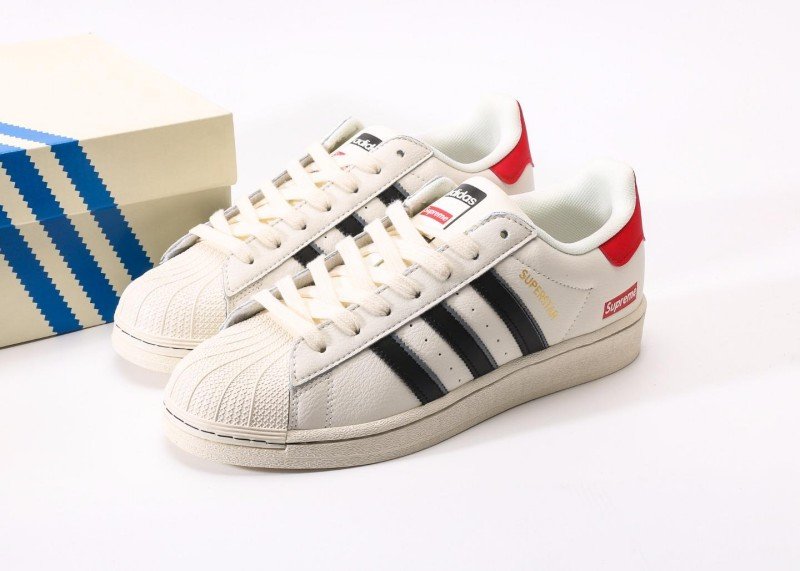adidas-x-supreme-collaboration-off-white-striped-sneakers