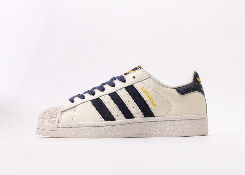 adidas-superstar-off-white-and-blue-striped-sneakers