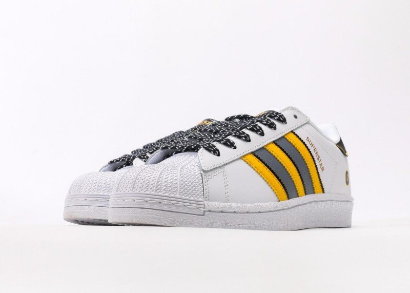 adidas yellow and gray striped shell toe sneakers - Image 5