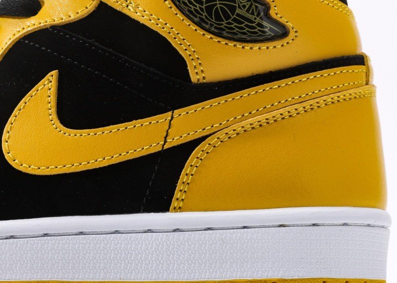 Air Jordan 1 Retro Mid Black Yellow Colorway Sneaker - Image 7