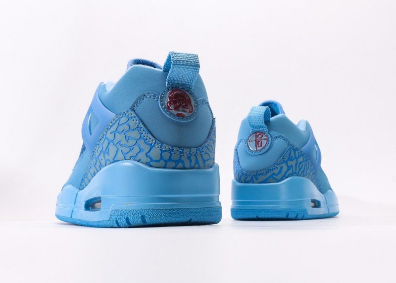 Air Jordan 4 Retro Light Blue Snake Texture Sneaker - Image 6